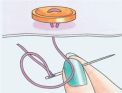 How to sew a two-hole button