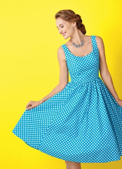 Blue and yellow polka dot dress shop