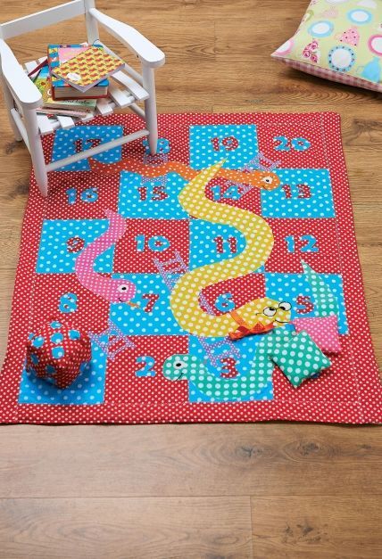 Fabric snakes and ladders playmat