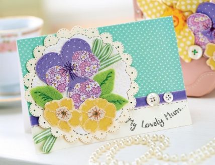 http://www.sewmag.co.uk/free-sewing-patterns/floral-brooch-and-card-for-mum