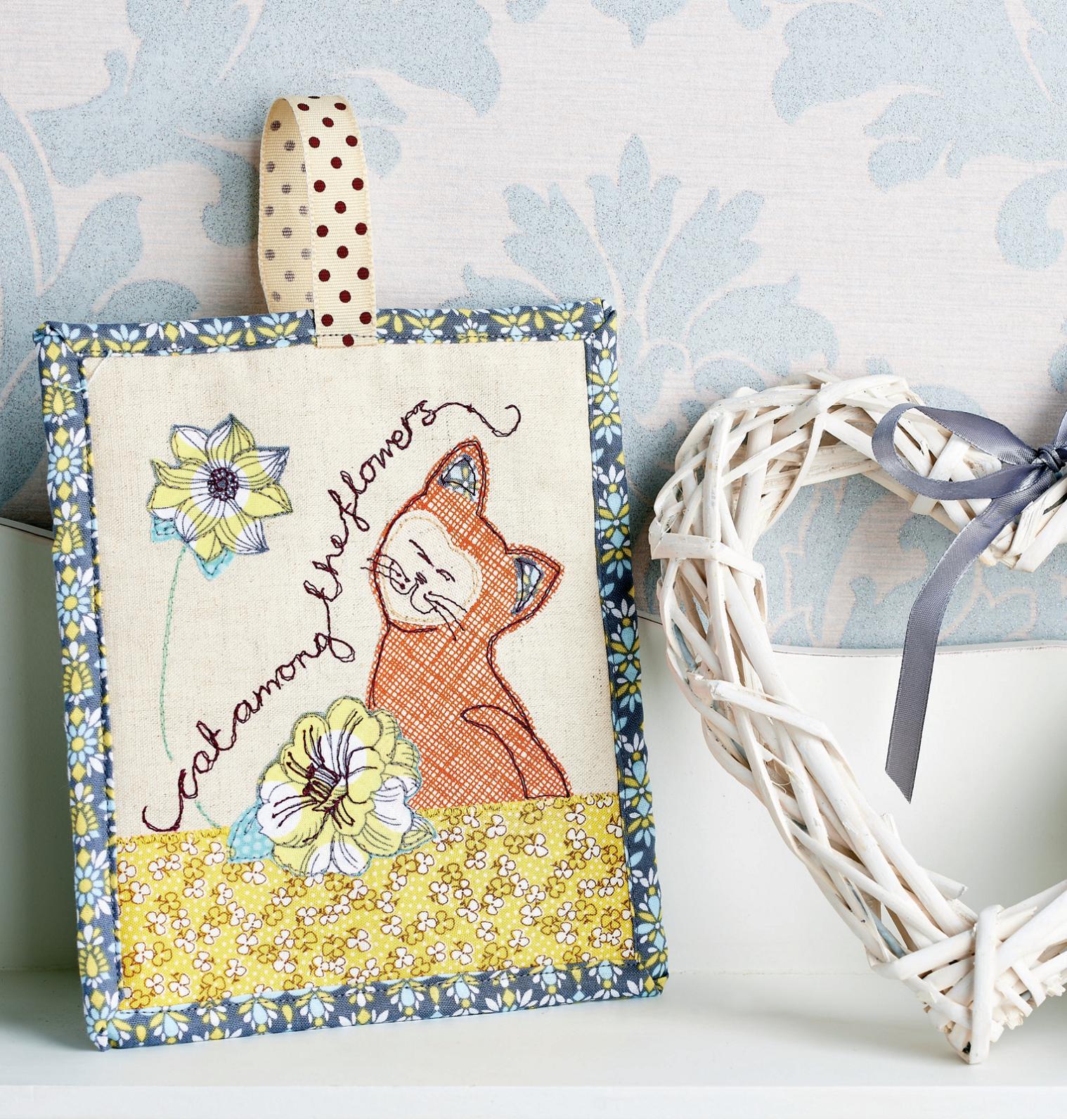 Embroidered Cat Doorstop and Hanging Pocket Free sewing patterns